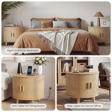Cargar imagen en el visor de la galería, 24" Round End Table with Storage &amp; Charging Station, Fluted Design, sofa side table with sliding door, Mid-Century Modern Nightstand for Living Room, Bedroom, Natural
